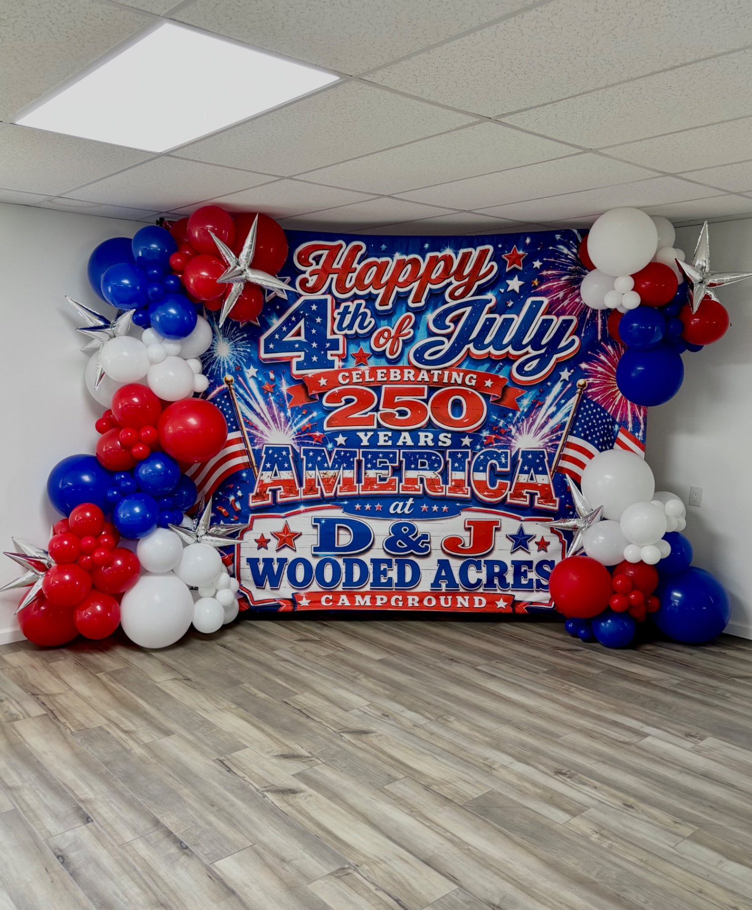 Red, white, blue and silver star balloon installation for the 4th of July